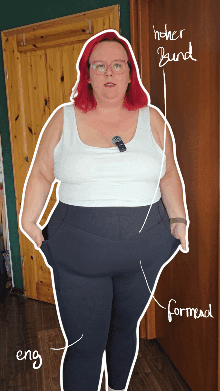 Dicke rothaarige Frau trägt eine formende schwarze Leggings, deren Eigenschaften auf dem Bild beschrieben werden